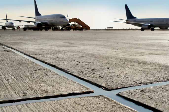 Airport runway sealed with chemical resistant SABA sealant.