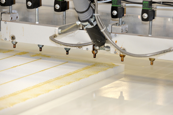 Automated foam bonding process with SABA hot melt adhesives